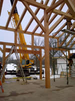 Thumbnail image of 70 ton crane lifting wooden beams