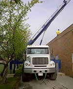 Thumbnail image of 40 ton crane lifting air units onto a mall