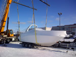 Thumbnail image of lifting a large boat cruiser