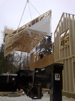 Thumbnail image of lifting other half of roof section. All roof sections were put up in one day