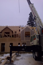 Thumbnail image of lifted roof sections. All roof sections were put up in one day